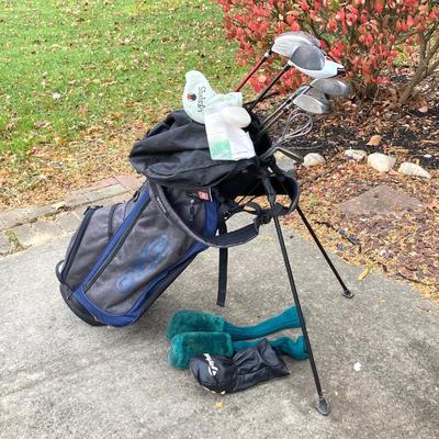 LOT 33: Collection of Golf Clubs and Accessories - Taylor Made, Callaway, Ram, Vesuvius Ceramic Putter with Ogio Golf Bag