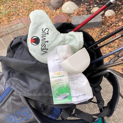 LOT 33: Collection of Golf Clubs and Accessories - Taylor Made, Callaway, Ram, Vesuvius Ceramic Putter with Ogio Golf Bag
