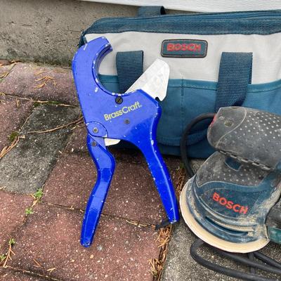 LOT 36: Bosch Reciprocating Saw RS325, Orbit Sander with Bosch Tool Bag and Contents