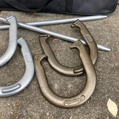 LOT 37: Outdoor Yard Games Collection in Storage Bags - Champion Sports Horseshoes, Franklin Volleyball & Badminton Set and Pointyard...