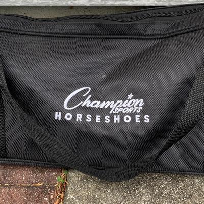 LOT 37: Outdoor Yard Games Collection in Storage Bags - Champion Sports Horseshoes, Franklin Volleyball & Badminton Set and Pointyard...