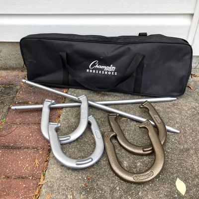 LOT 37: Outdoor Yard Games Collection in Storage Bags - Champion Sports Horseshoes, Franklin Volleyball & Badminton Set and Pointyard...
