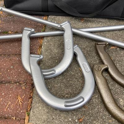 LOT 37: Outdoor Yard Games Collection in Storage Bags - Champion Sports Horseshoes, Franklin Volleyball & Badminton Set and Pointyard...