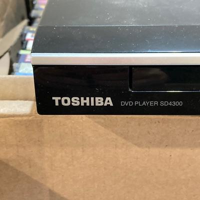 LOT 69: Toshiba DVD Player Model No. SD4300KU with Large Collection of DVDs