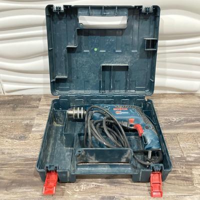 LOT 73: Bosch Tool Collection - Impactor, Driver, Batteries, Charger, Corded 1191VSR Drill and Carry Case