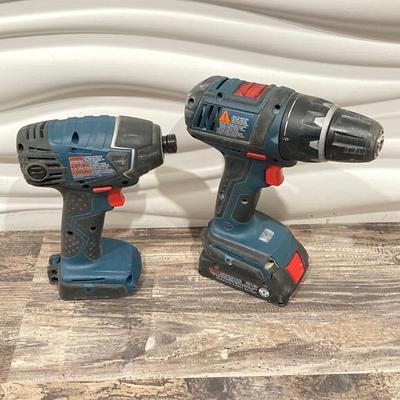 LOT 73: Bosch Tool Collection - Impactor, Driver, Batteries, Charger, Corded 1191VSR Drill and Carry Case