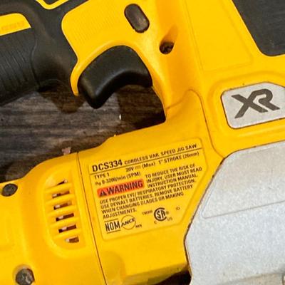 LOT 81: DeWalt Cordless Tools - Circular Saw DCS391, Jig Saw DCS334, Battery, Compact Stapler and Storage Bag