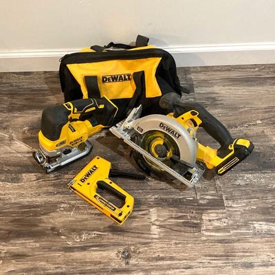 LOT 81: DeWalt Cordless Tools - Circular Saw DCS391, Jig Saw DCS334, Battery, Compact Stapler and Storage Bag