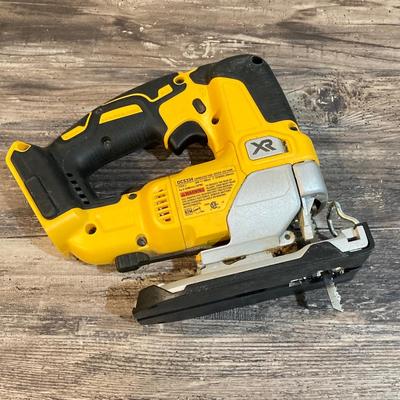 LOT 81: DeWalt Cordless Tools - Circular Saw DCS391, Jig Saw DCS334, Battery, Compact Stapler and Storage Bag