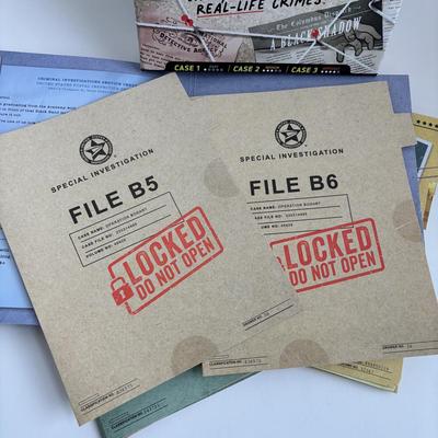 LOT 87: Murder Mystery Games, True Crime Stories Game & Unopened Cold Case Cracked Game