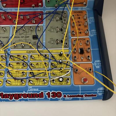 LOT 95: Elenco Electronics Playground 130 & Learning Center along with Thames & Kosmos Physics Workshop