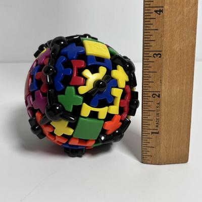 LOT 96: NIP Gleeporte Wooden Peg Puzzle & Play 22 Sorting Cube, Meffert's Gear Ball 3D Mechanical Puzzle, Cheerios Bilingual...