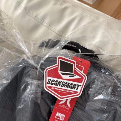 LOT 101: NIP Black Swiss Gear Scan Smart Laptop Backpack