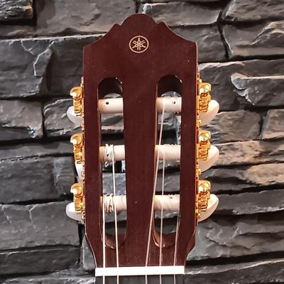 LOT 109: Yamaha CG182C Cedar Top Classical Acoustic Guitar with Stagg Guitar Case & Capo