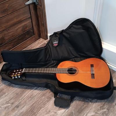 LOT 109: Yamaha CG182C Cedar Top Classical Acoustic Guitar with Stagg Guitar Case & Capo