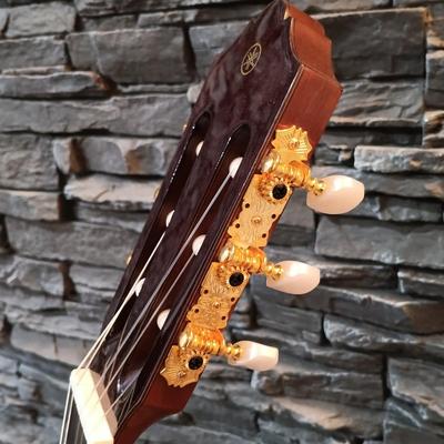 LOT 109: Yamaha CG182C Cedar Top Classical Acoustic Guitar with Stagg Guitar Case & Capo