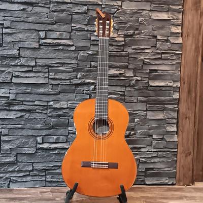 LOT 109: Yamaha CG182C Cedar Top Classical Acoustic Guitar with Stagg Guitar Case & Capo