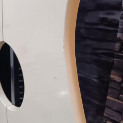 LOT 115: Vintage Guitar-Shaped CD Stand