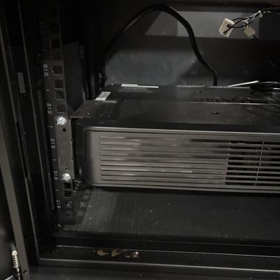 LOT 148: Pure Sign Tripp Light Uninterruptible SMART1500LCD 1500VA Rack Mount UPS Battery Backup, 900W, in cooling rack