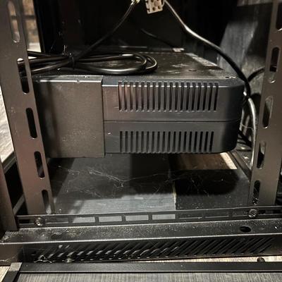 LOT 148: Pure Sign Tripp Light Uninterruptible SMART1500LCD 1500VA Rack Mount UPS Battery Backup, 900W, in cooling rack