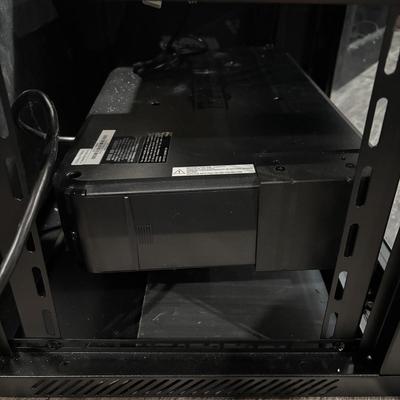 LOT 148: Pure Sign Tripp Light Uninterruptible SMART1500LCD 1500VA Rack Mount UPS Battery Backup, 900W, in cooling rack