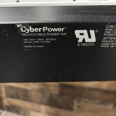 LOT 149: Producer Desk with Locking Keyboard Tray and Cyber Power CPS-1215 RM Surge Protector,