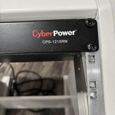 LOT 149: Producer Desk with Locking Keyboard Tray and Cyber Power CPS-1215 RM Surge Protector,