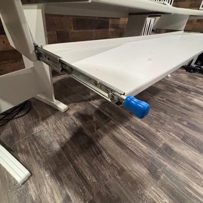 LOT 149: Producer Desk with Locking Keyboard Tray and Cyber Power CPS-1215 RM Surge Protector,