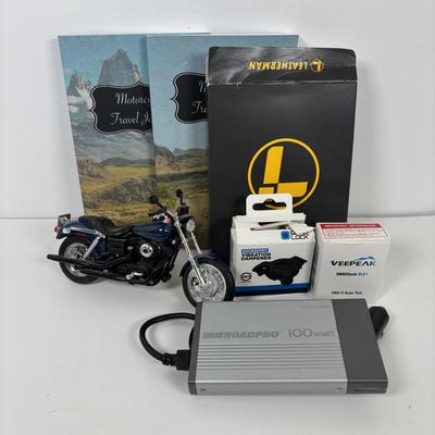 LOT 150: On the Road Collection: Road Pro RPP1-100USB Inverter, Vee Peak Scan Tool, Quro Lock Vibration Damper, Leatherman Multi Tool,...