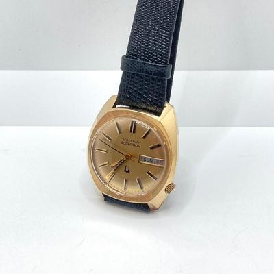 LOT 166: Vintage Bulova Accutron Calendar Watch with Leather Band