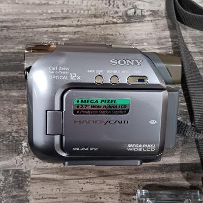 LOT 190: Sony HandyCam DCR-HC42, Kodak EasyShare Z712 IS, Table Top Tripod & More