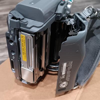 LOT 190: Sony HandyCam DCR-HC42, Kodak EasyShare Z712 IS, Table Top Tripod & More