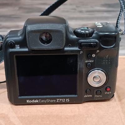 LOT 190: Sony HandyCam DCR-HC42, Kodak EasyShare Z712 IS, Table Top Tripod & More