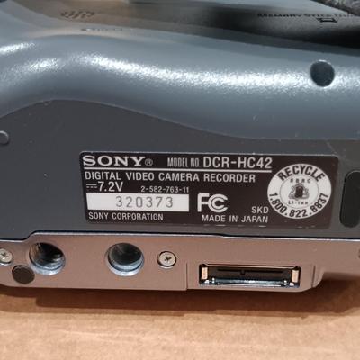 LOT 190: Sony HandyCam DCR-HC42, Kodak EasyShare Z712 IS, Table Top Tripod & More