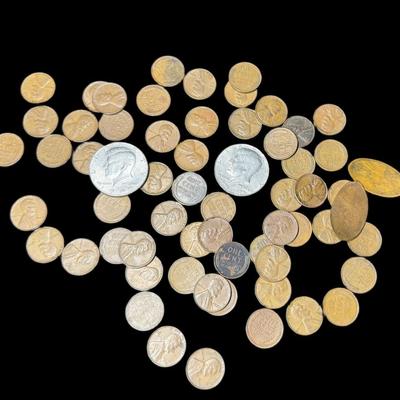 Sale Photo Thumbnail #762: Includes 58 Lincoln cents from the 1920s to the 1950s, two Kennedy half dollars, and two flattened (souvenir) pennies. Total of 62 pieces. [RM]