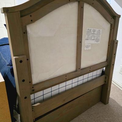 Sale Photo Thumbnail #316: Twin trundle bed # .with mattresses. Driftwood color with natural colored upholstered headboard. SHEETS AND BEDDING (comforter, pillow, sham, sheets, & blanket) ARE NOT INCLUDED, The nightstand you see in the photograph is also NOT included. Note that the