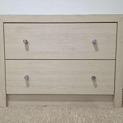 Sale Photo Thumbnail #318: This is a pair of two modern lightwood colored veneer nightstands. Each has some flaws as shown in the photos. Please zoom in on each picture for details. They measure 35"L X 17"D x 26"H. You are bidding on both, meaning you must pay for and take both nig