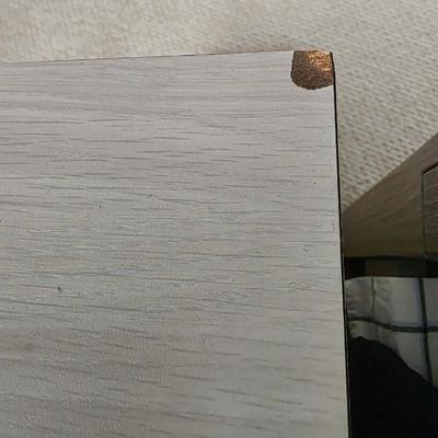 Sale Photo Thumbnail #323: This is a pair of two modern lightwood colored veneer nightstands. Each has some flaws as shown in the photos. Please zoom in on each picture for details. They measure 35"L X 17"D x 26"H. You are bidding on both, meaning you must pay for and take both nig