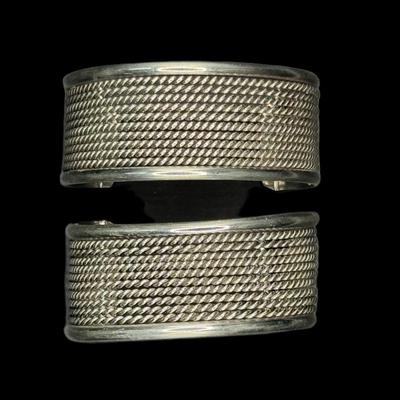 Sale Photo Thumbnail #784: **WIRE TRANSFER IS REQUIRED IF SHIPPED.** [85.25g] Includes a pair of Taxco reticulated sterling bracelets. Measurement: 2.5” Diameter (each). **ALL PRECIOUS METALS SALES ARE FINAL. NO REFUNDS WILL BE GIVEN FOR ANY REASON.** [RM]