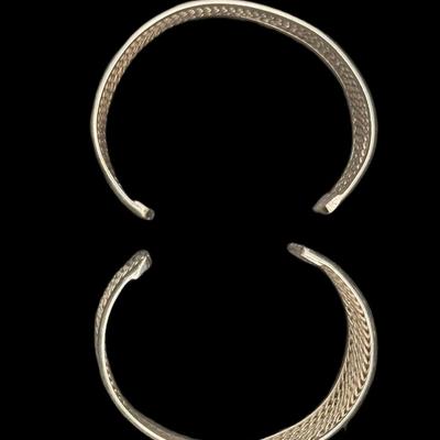 Sale Photo Thumbnail #785: **WIRE TRANSFER IS REQUIRED IF SHIPPED.** [85.25g] Includes a pair of Taxco reticulated sterling bracelets. Measurement: 2.5” Diameter (each). **ALL PRECIOUS METALS SALES ARE FINAL. NO REFUNDS WILL BE GIVEN FOR ANY REASON.** [RM]