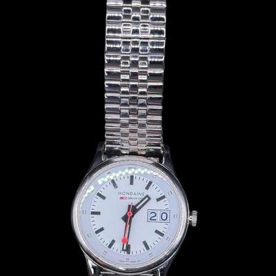 Sale Photo Thumbnail #787: This watch features Swiss quartz movement, a stainless steel expansion bracelet, and tritium micro gas lights for illumination in the dark. Not tested. Pre-auction estimate: $100-$150. [RS]