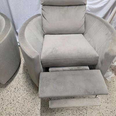 Sale Photo Thumbnail #344: Pair of modern gray microsuede swivel recliners. The recliners have curved armrests, and the light gray velvety fabric feels very elegant.  Each recliner has minor blemishes; most seem superficial dirty spots that could be easily cleaned, but please zoom 