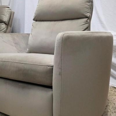 Sale Photo Thumbnail #329: Pair of modern gray microsuede swivel recliners. The recliners have curved armrests, and the light gray velvety fabric feels very elegant.  Each recliner has minor blemishes; most seem superficial dirty spots that could be easily cleaned, but please zoom 