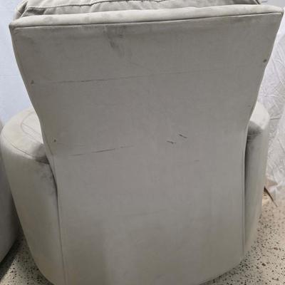 Sale Photo Thumbnail #341: Pair of modern gray microsuede swivel recliners. The recliners have curved armrests, and the light gray velvety fabric feels very elegant.  Each recliner has minor blemishes; most seem superficial dirty spots that could be easily cleaned, but please zoom 