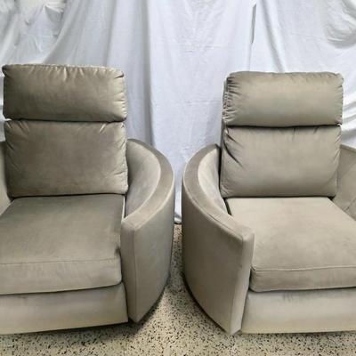 Sale Photo Thumbnail #335: Pair of modern gray microsuede swivel recliners. The recliners have curved armrests, and the light gray velvety fabric feels very elegant.  Each recliner has minor blemishes; most seem superficial dirty spots that could be easily cleaned, but please zoom 