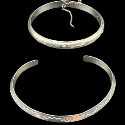 Sale Photo Thumbnail #790: **WIRE TRANSFER IS REQUIRED IF SHIPPED.** [47.71g] Includes two mid-century modern rings, a USMC gent’s ring, a cuff, and a bangle (safety chain needs to be repaired). Total of five pieces. Silver content confirmed using Niton XRF precious metals analyz