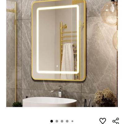 Sale Photo Thumbnail #350: Gold medicine cabinet #1 with 3 color temperature dimmable light mirror. Can be recessed or surface mounted. It measures 24"W x 30"H. "Brand new in original packaging. **Advertising photo used to show better what it looks like without the protective clear
