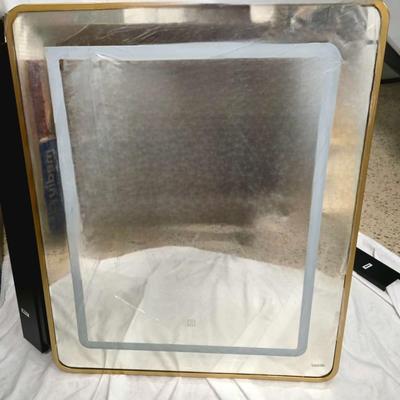 Sale Photo Thumbnail #349: Gold medicine cabinet #1 with 3 color temperature dimmable light mirror. Can be recessed or surface mounted. It measures 24"W x 30"H. "Brand new in original packaging. **Advertising photo used to show better what it looks like without the protective clear