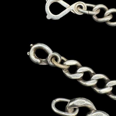 Sale Photo Thumbnail #803: **WIRE TRANSFER IS REQUIRED IF SHIPPED.** [92.33g] Includes an Asian themed ID style bracelet, a plain ID bracelet, and a personalized ID bracelet. Total of three pieces. Measurement of longest: 8”. Silver content confirmed using Niton XRF precious meta