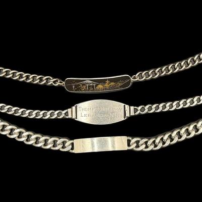 Sale Photo Thumbnail #801: **WIRE TRANSFER IS REQUIRED IF SHIPPED.** [92.33g] Includes an Asian themed ID style bracelet, a plain ID bracelet, and a personalized ID bracelet. Total of three pieces. Measurement of longest: 8”. Silver content confirmed using Niton XRF precious meta